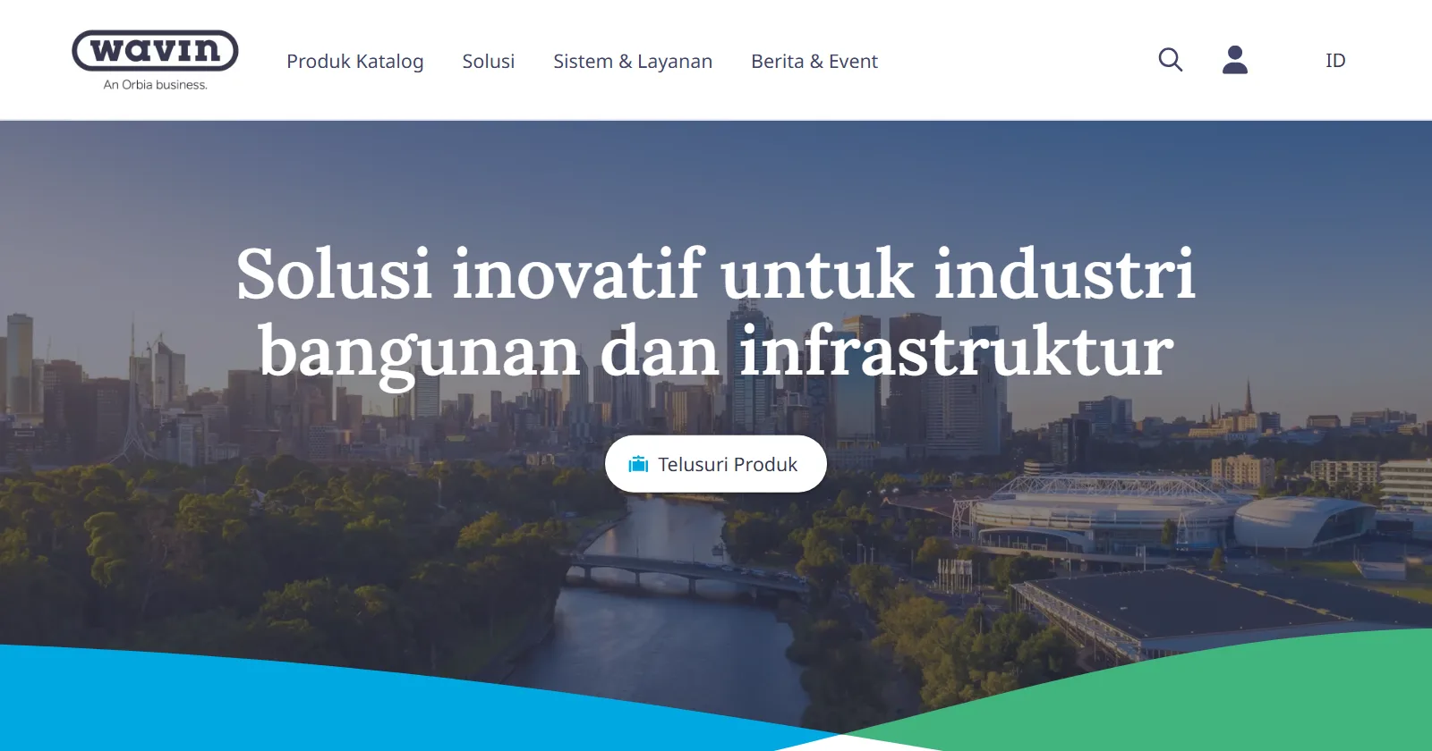 Tangkapan layar layar pertama beranda Wavin Indonesia: logo Wavin, menu Produk Katalog, Solusi, Sistem dan Layanan, Berita dan Event, judul Solusi inovatif untuk industri bangunan dan infrastruktur di atas foto udara kota, dan tombol Telusuri Produk
